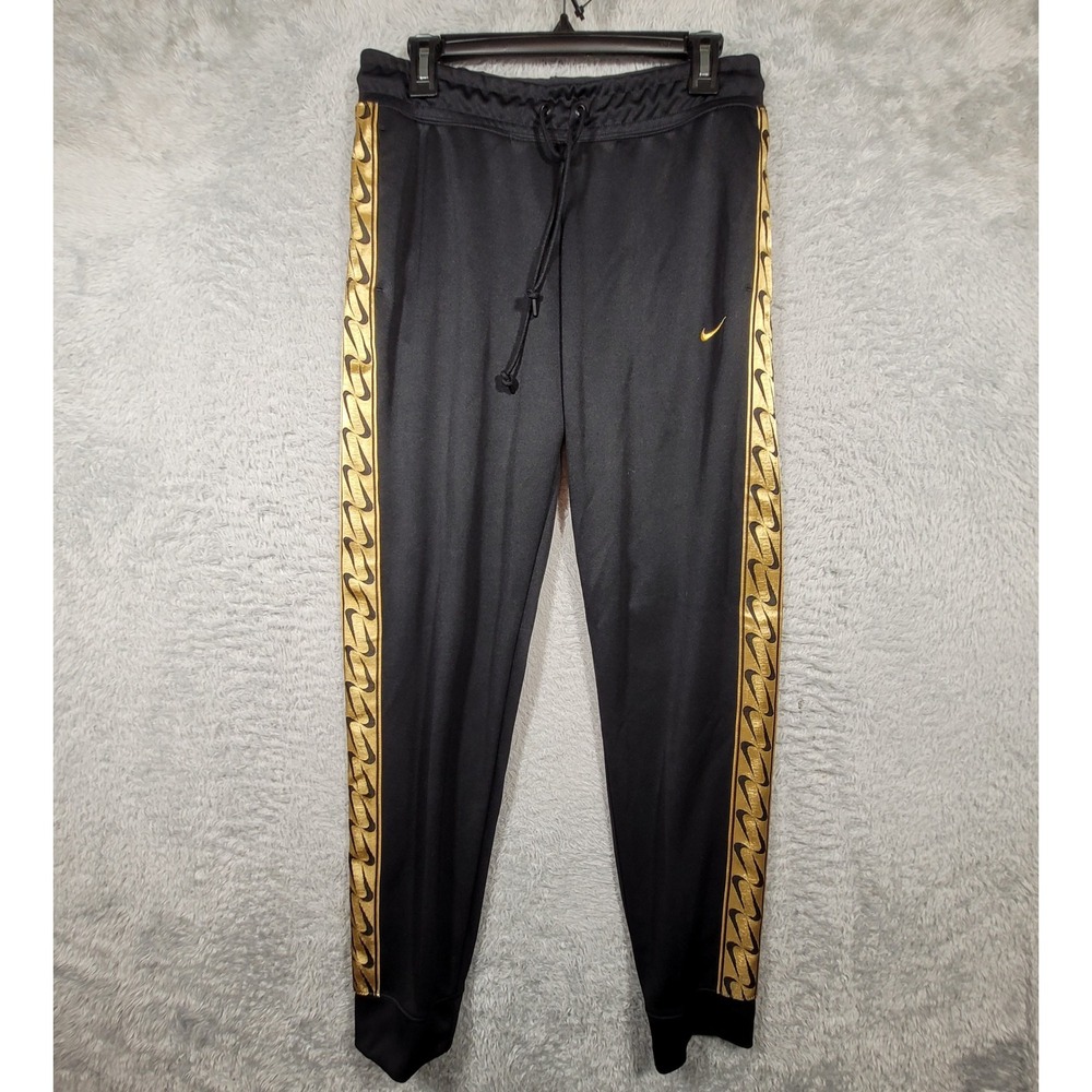Nike Track Pants Womens Medium Black Gold Repeat Swoosh Logo Taped Side Seams